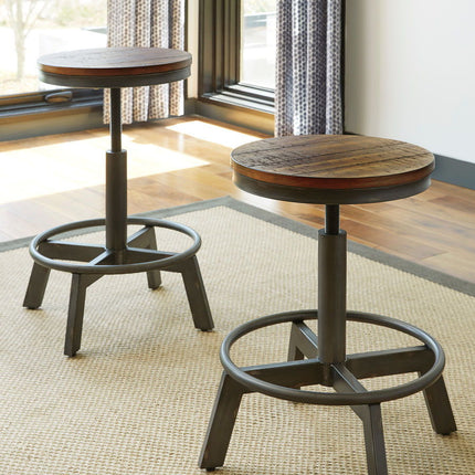 Torjin - 3 Pc. - Long Counter Table, 2 Stools - Dark Brown