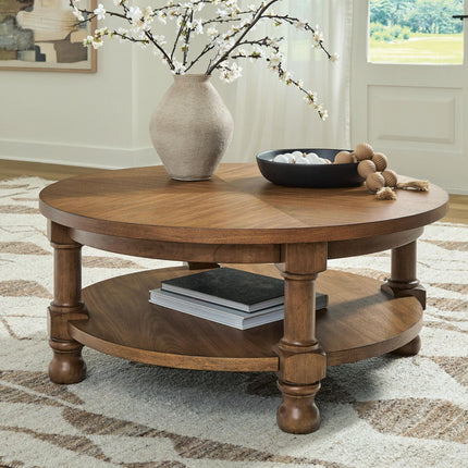 Chadworth - Round Cocktail Table - Medium Brown