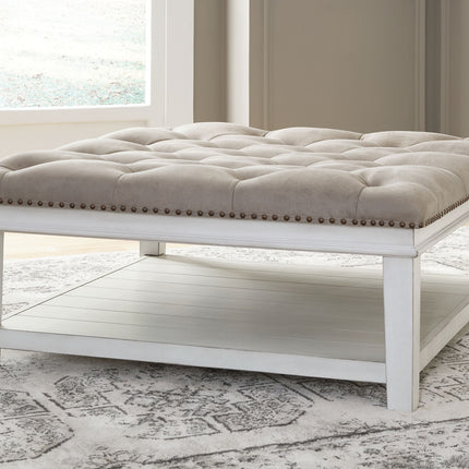 Kanwyn - Uph Ottoman Cocktail Table - Whitewash